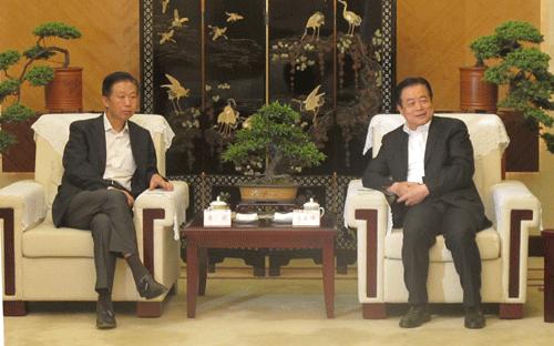 蒋巨峰在成都会见国家税务总局局长肖捷